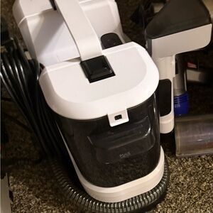 White and Black Vacuum Cleaner
